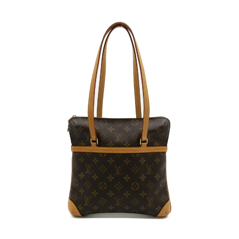 Christian Dior handbags with a removable shoulder strap for versatilityLouis Vuitton Alma bags featuring the signature top - handle designLOUIS VUITTON Kusan GM Brown Monogram PVC coated canvas M51141