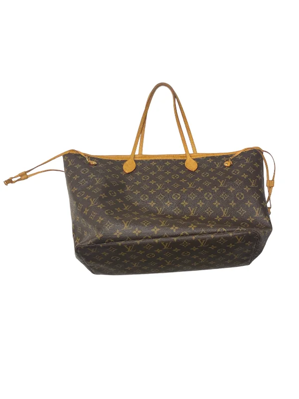 Christian Dior handbags with a removable shoulder strap for versatilityLouis Vuitton Speedy bags in monogram canvas for a classic lookHandbag Luxury Designer By Louis Vuitton  Size: Large