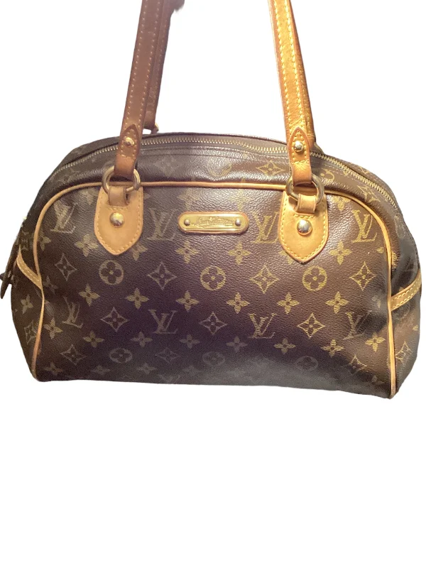 Christian Dior bags with a quilted pattern and gold - toned hardwareLouis Vuitton crossbody bags with adjustable shoulder straps for comfortHandbag Designer By Louis Vuitton  Size: Medium