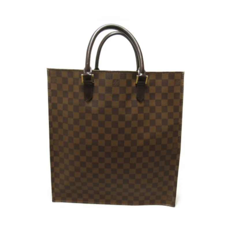 Christian Dior bags with a zip - top closure and multiple compartmentsLouis Vuitton bags with a snap - button closure and a decorative charm for styleLOUIS VUITTON Sac Plat Brown Ebene Damier PVC coated canvas N51140