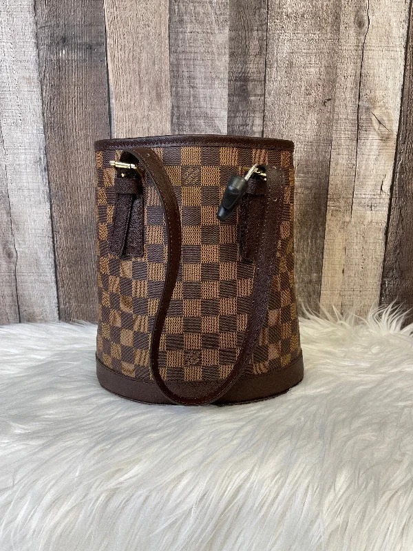 Christian Dior bags with a side - pocket for holding a water bottleLouis Vuitton Speedy bags in monogram canvas for a classic lookHandbag Designer By Louis Vuitton  Size: Large