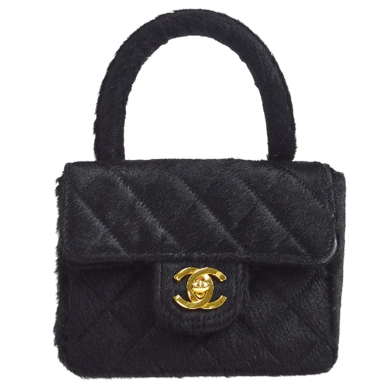 Chanel bags with leather and tweed combinationsCHANEL * 1991-1994 Classic Flap Handbag Micro Black Pony Hair