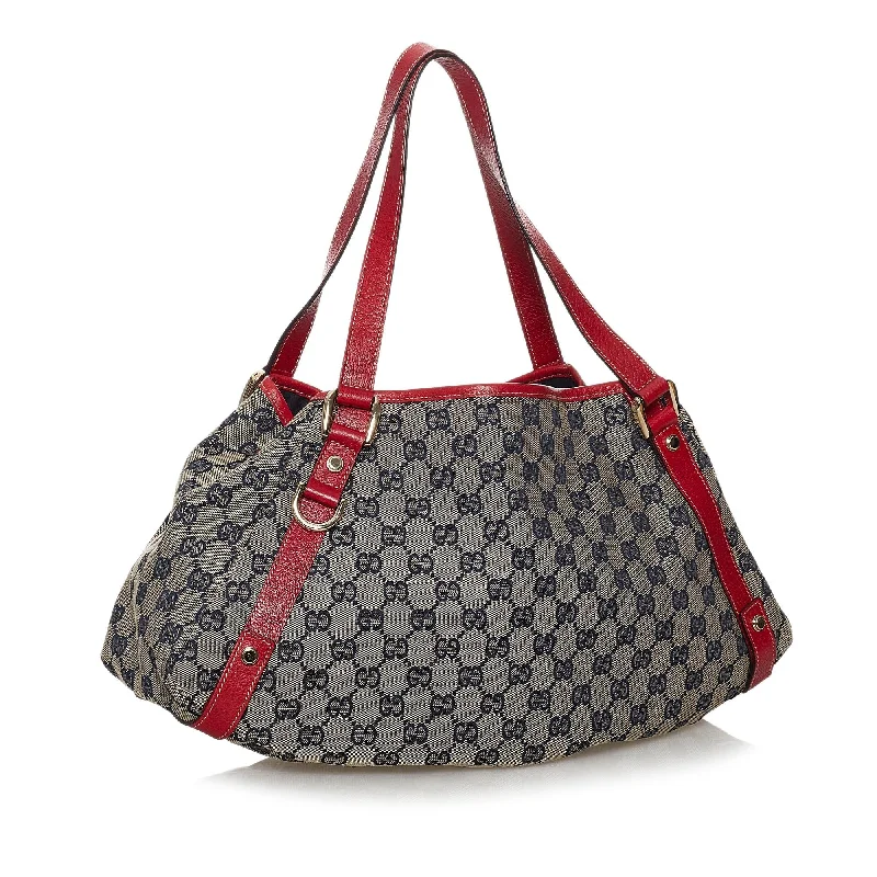 Women Gucci bags with a magnetic snap closure for easy accessGucci GG Canvas Pelham Shoulder Bag (30228)