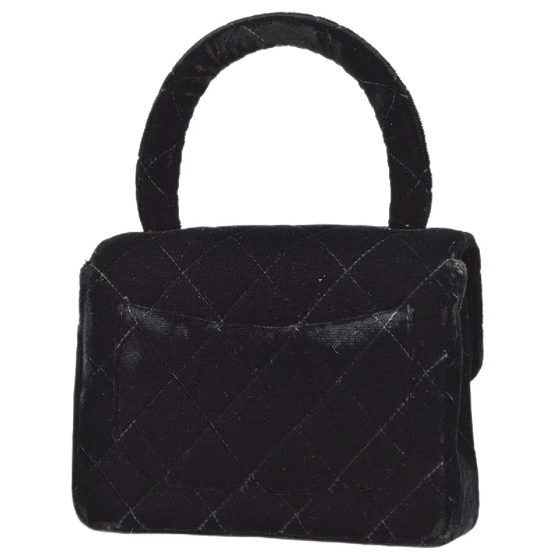 Chanel bags with modern touchesChanel 1994-1996 Black Velvet Micro Classic Flap Handbag