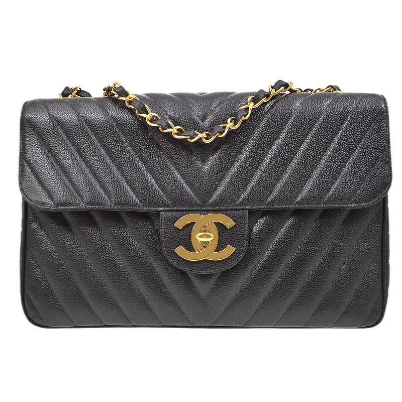 Chanel bags with leather and tweed combinationsCHANEL 1991-1994 Black Caviar Chevron Classic Flap Bag Maxi