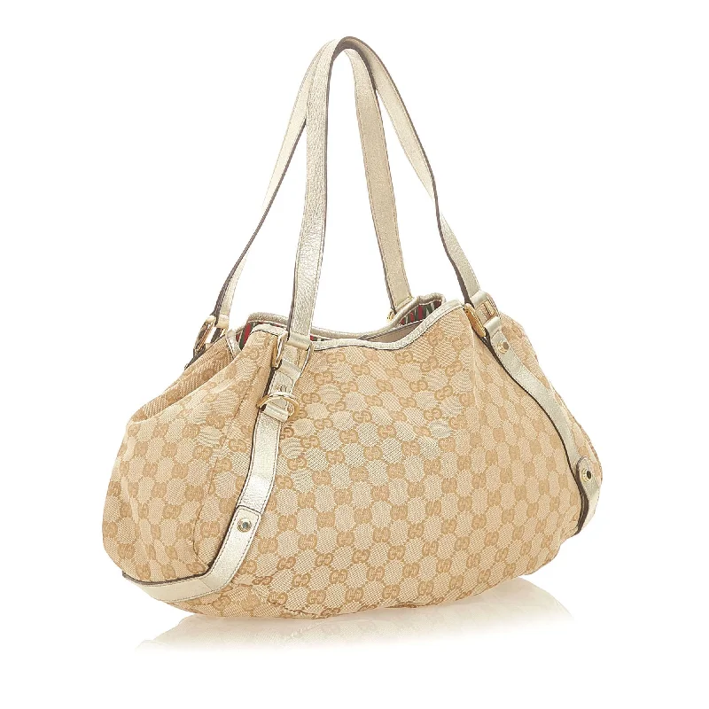 Women Gucci Sylvie bags with a monogram - embossed leatherGucci GG Canvas Pelham Tote Bag (32148)