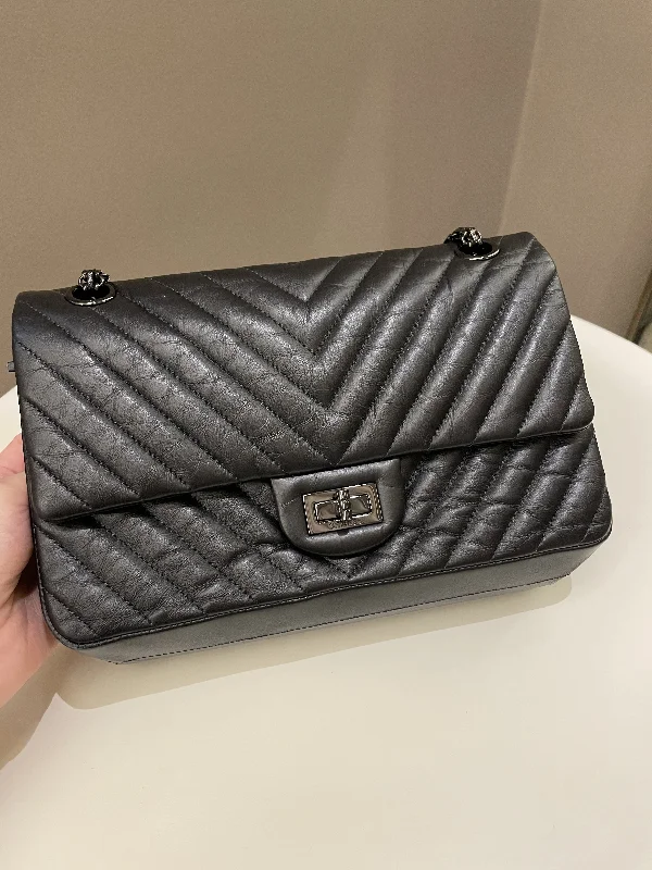 Chanel bags with iconic gold chainsChanel 2.55 225 So Black Chevron Reissue Double Flap Black Calfskin