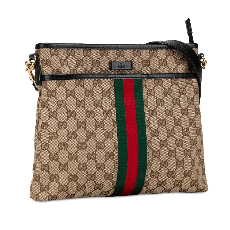 Women Gucci Sylvie bags with a crystal - embellished web stripeGucci GG Canvas Web Crossbody Bag I38dSw)