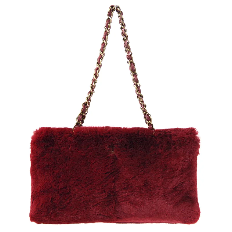 Chanel bags with gold, silver, and pearl accentsCHANEL 2000-2001 Chain Tote Bordeaux Fur