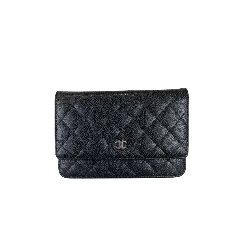 Chanel bags for women who love timeless fashionWOC Caviar Black SHW