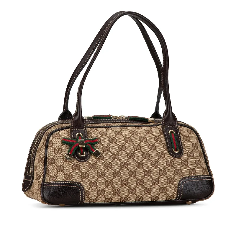 Women Gucci Sylvie bags with a monogram - embossed leatherGucci GG Canvas Princy Shoulder Bag Mnv41w)