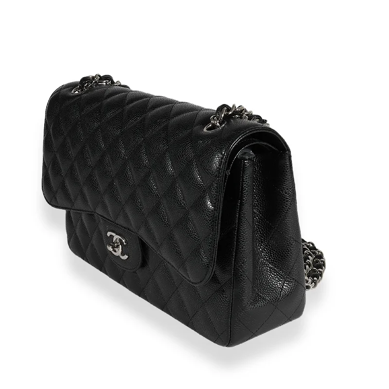 Chanel bags with gold, silver, and pearl accentsChanel Black Quilted Caviar Jumbo Classic Double Flap Bag