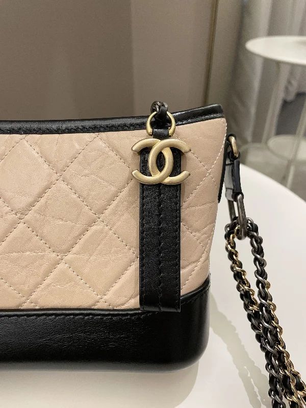 Chanel bags with iconic stitching detailsChanel Quilted Gabrielle Hobo Beige/ Black Aged Calfskin