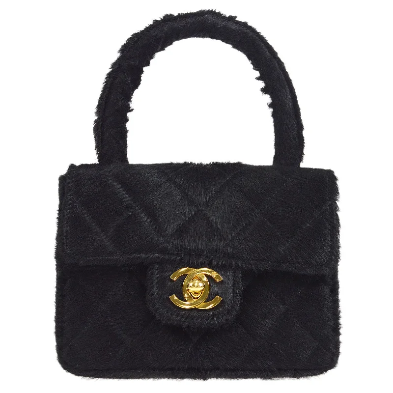 Chanel bags with intricate metal hardwareCHANEL * 1990s Classic Flap Handbag Micro Black Pony Hair