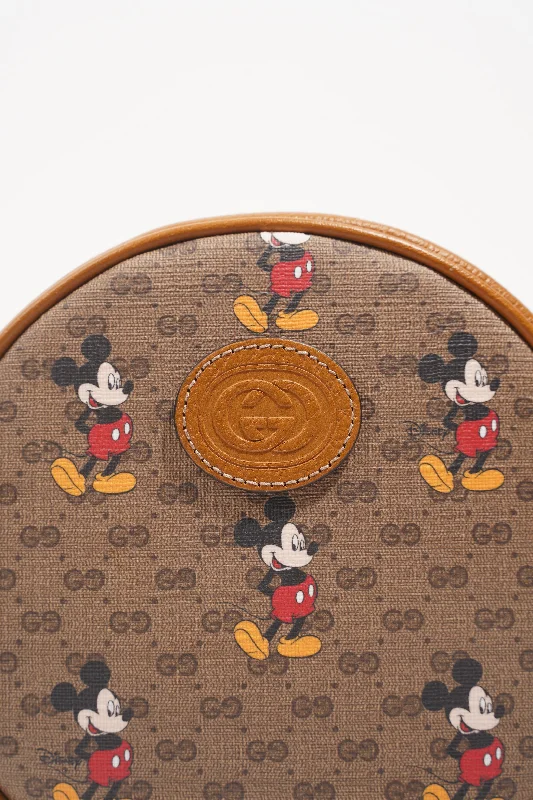 Women Gucci backpacks with a luxurious leather finishGucci x Disney Womens Round Mini Backpack Supreme Brown