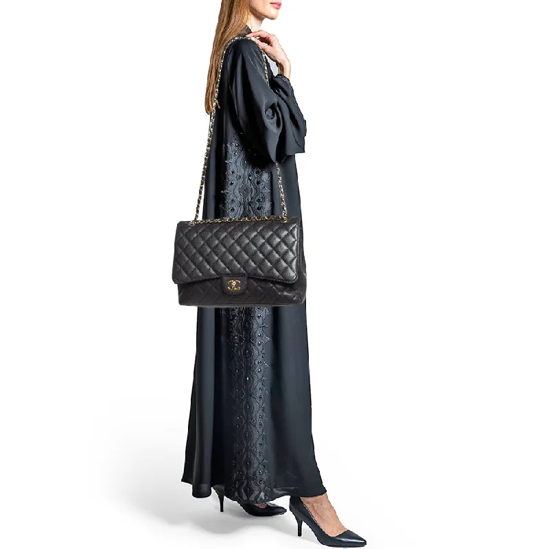 Chanel bags for women with a taste for high fashionCHANEL Black Quilted Caviar Leather Maxi Classic Single Flap Bag