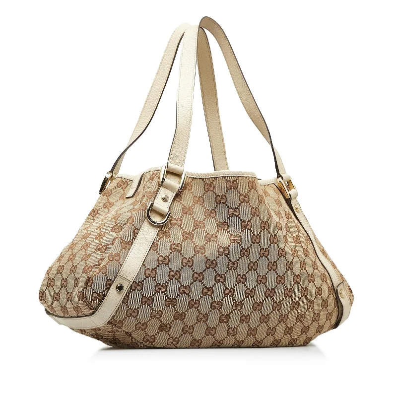 Women Gucci bags with a magnetic snap closure for easy accessGucci GG Canvas Pelham Shoulder Bag (JSlUEo)