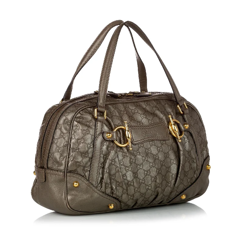 Ladies Gucci shoulder bags with a tassel decorationGucci Guccissima Jockey Boston Bag (SHG-rJe3jo)