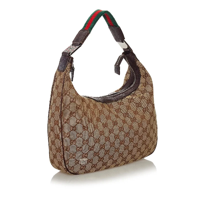 Women Gucci bags with a zippered interior pocketGucci GG Canvas Web Shoulder Bag (33600)