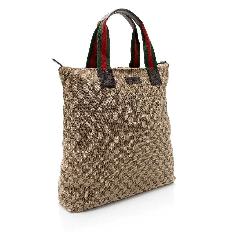 Women Gucci bags with a chain - link trim and a leather bodyGucci GG Canvas Web N/S Large Tote (3n3x28)