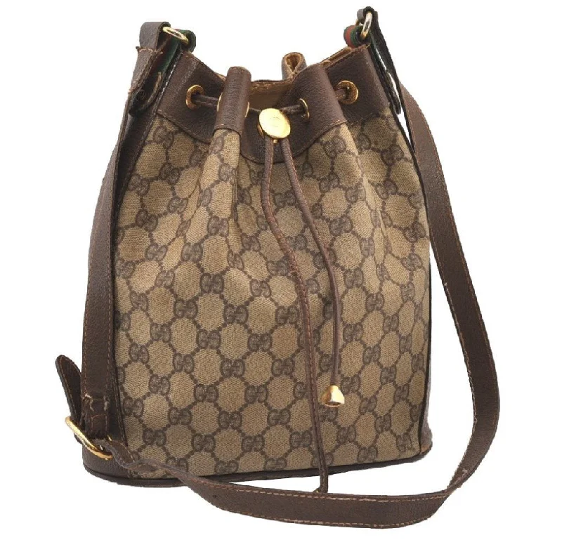 Gucci Marmont bags for women with a contrast - colored interiorAuthentic GUCCI Web Sherry Line Drawstring Bag GG PVC Leather Brown Junk 2712J