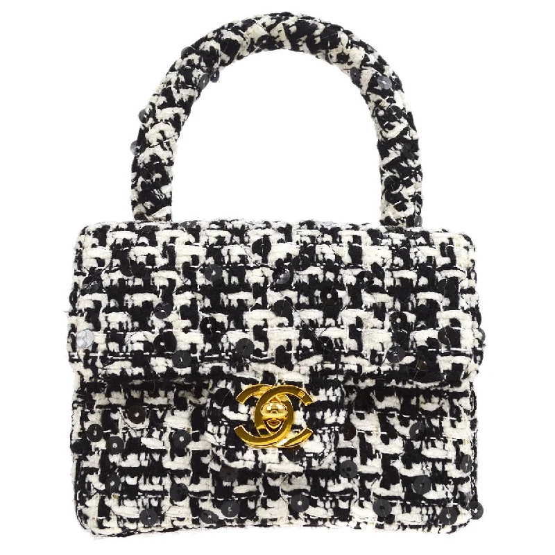 Chanel bags available in bold colors and patternsCHANEL * 1991-1994 Classic Flap Handbag Micro Tweed