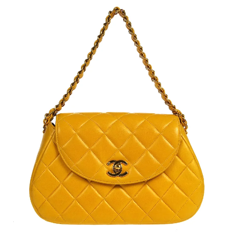 Chanel bags with gold, silver, and pearl accentsChanel 1996-1997 Round Flap Handbag Orange Lambskin