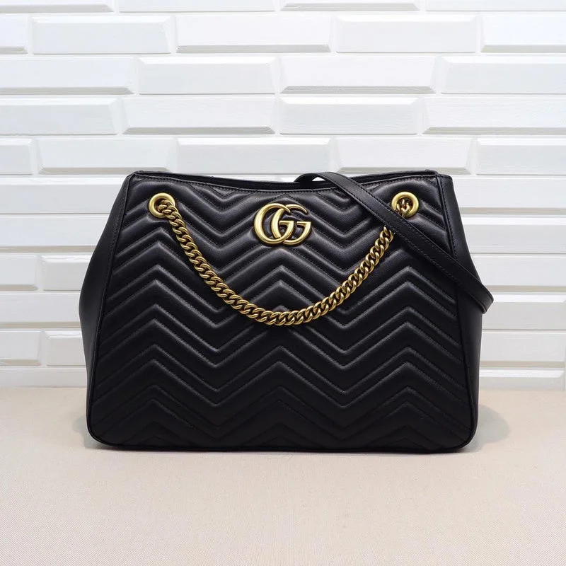 Women Gucci bags with a snap - button closure and a decorative charmBC - GUCCI BAG - 548