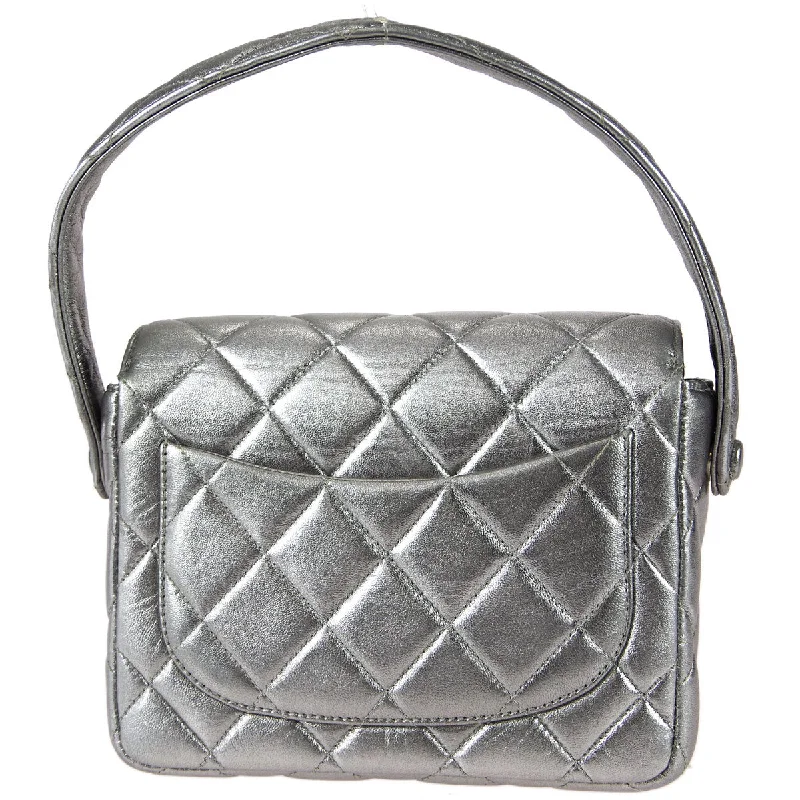 Chanel bags available at online luxury retaileChanel * 1996-1997 Silver Lambskin Mini Classic Flap Handbag 17