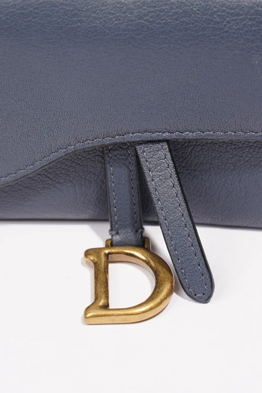 Christian Dior tote bags with a printed Dior logo on the frontChristian Dior Saddle Micro With Chain Blue Leather