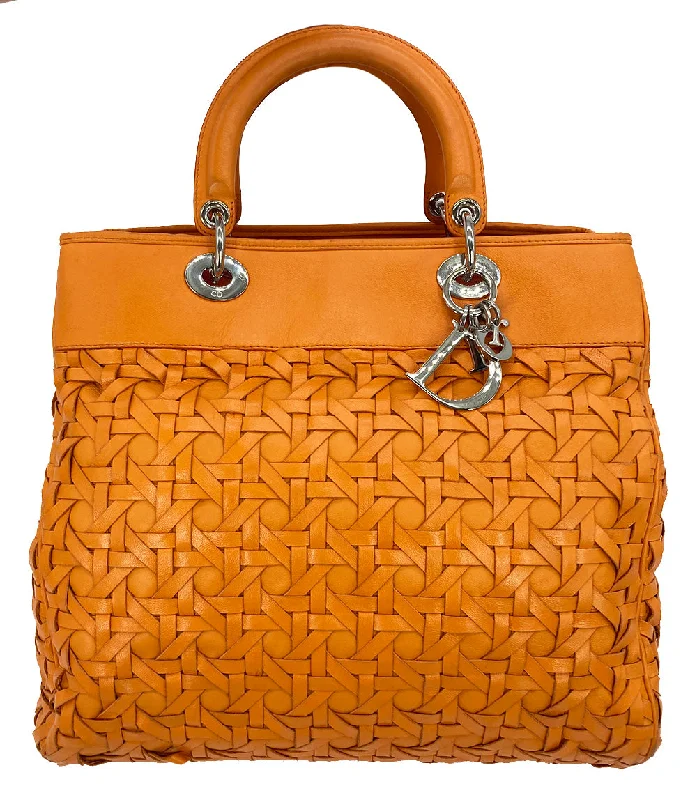 Contemporary Christian Dior handbags with a unique shapeChristian Dior Woven Leather Orange Lady Dior Avenue Tote