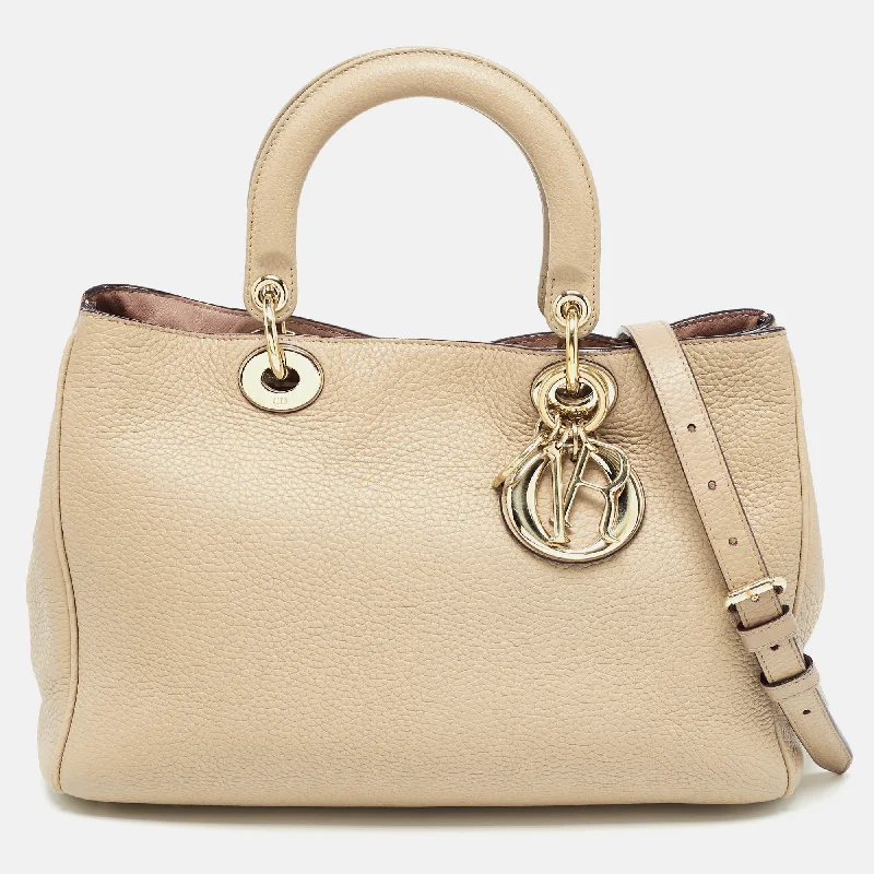 Christian Dior bags with a side - pocket for holding a water bottleDIOR Beige Leather Medium issimo Shopper Tote