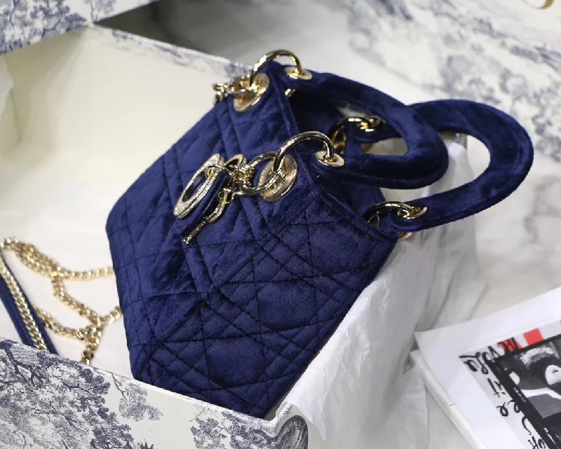 Christian Dior Saddle bags with a distressed leather finishChristian Dior Blue Velvet Mini Lady Christian Christian Dior Bag With Chain