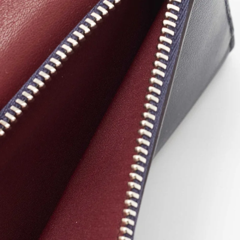 Christian Dior crossbody bags with a front - flap pocket for easy accessChristian Dior Burgundy/Dark Blue Leather issimo Envelope Wallet