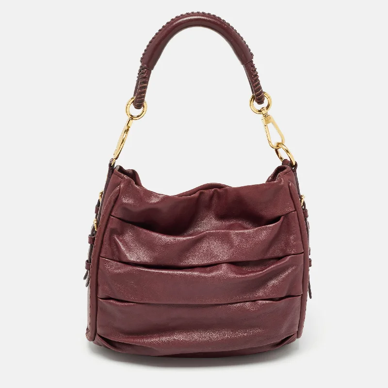 Christian Dior Saddle bags with a distressed leather finishDIOR Burgundy Pleated Leather Libertine Hobo