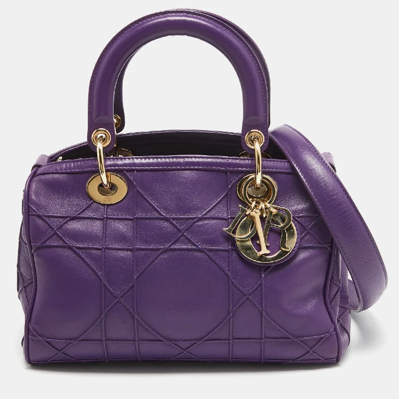 Christian Dior Saddle bags with a distressed leather finishDIOR Purple Leather Granville Polochon Bag