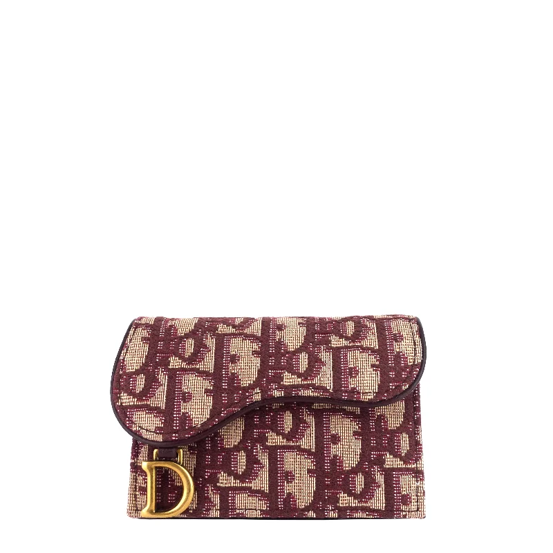 Christian Dior bags with a quilted pattern and gold - toned hardwareDIOR Saddle Lotus Dior Oblique Jacquard Wallet