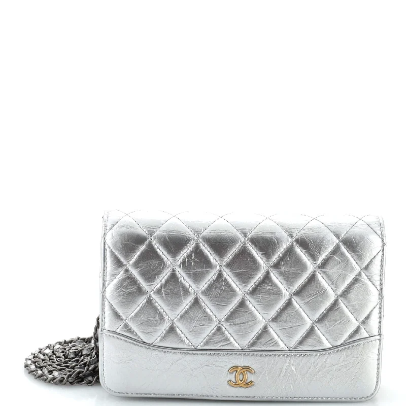 Christian Dior Saddle bags with a patent leather finish for a shiny lookGabrielle Wallet on Chain Quilted Aged Calfskin